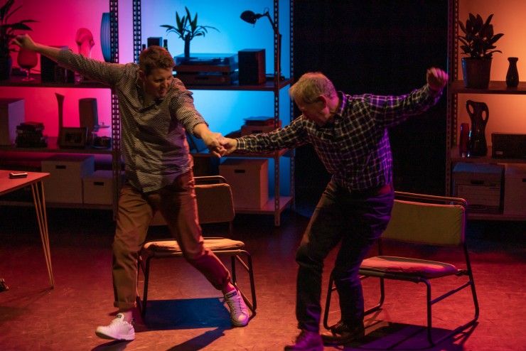 Men dancing in a play